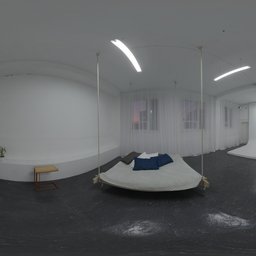 360-degree HDRI of a modern photo studio with professional lighting and minimalist decor.