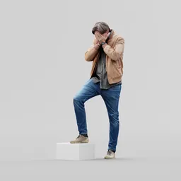 Guy covers his face with his palms