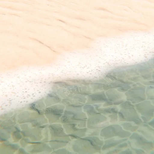 Realistic 3D-rendered beach scene with clear water, sand, and light patterns created in Blender.