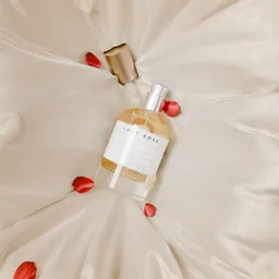 Perfume on silk cloth mockup