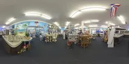 360-degree HDR panorama inside a well-lit grocery with shelves, chairs, and desks for scene lighting.