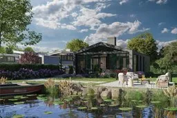 Residential house with terrace and pond with water lilies