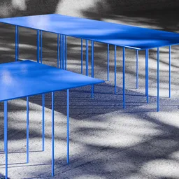 Glossy blue 3D modeled tables with sleek design for 3D rendering and Blender projects.