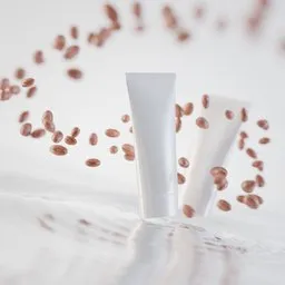 3D modeled blank cosmetics tubes with floating coffee beans, customizable materials and design for product visualization.