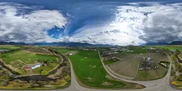 Aerial Farmland and Mountain Landscape