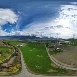 Aerial Farmland and Mountain Landscape