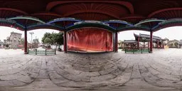 Chinese cultural stage with intricate designs, surrounded by nature under a cloudy sky, perfect for scene illumination.