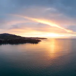 Golden Cloudy Sunrise Sky at Ocean