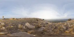 360-degree HDR panorama featuring rocky terrain and overcast sky for realistic lighting in 3D scenes.
