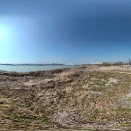 Dry grass clouds sunshine river