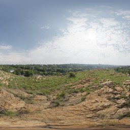 360-degree HDR panorama for scene lighting, featuring rocky foreground and cloudy sky.