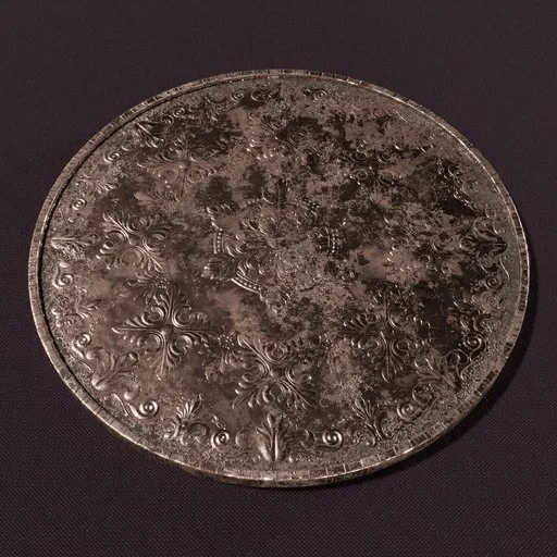 Detailed 3D coin with intricate design, textured in 4k using Blender and Substance Painter.