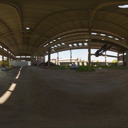 360-degree HDR panorama of an empty industrial depot interior with natural lighting.