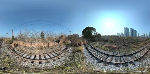 Railwall station train tree clouds