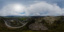 360-degree panoramic HDR image capturing a dramatic cloudy skyline over an urban landscape for scene lighting.