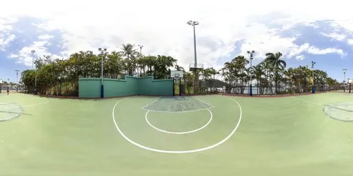 Outdoor green basketball court HDR with clear lines and palm trees under cloudy sky for 4K scene lighting.