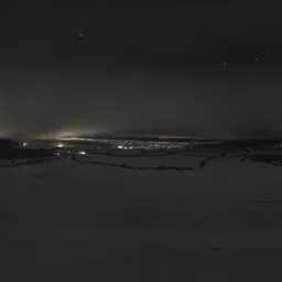 Snowy Night Over Farm Fields