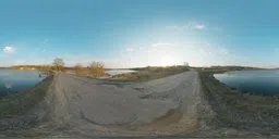 360-degree panoramic HDR of serene lake with clear blue sky for realistic lighting in 3D scenes