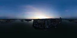 Twilight panorama HDR for 3D scene lighting showcasing a city's waterfront and skyline transitioning from day to night.