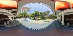 Bright park scene with iron gym structure for 3D scene lighting, clear blue sky, and vibrant greenery.