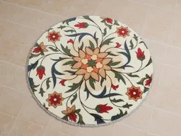 Round Persian-style rug 3D model with intricate floral pattern, optimized for Blender renderings.