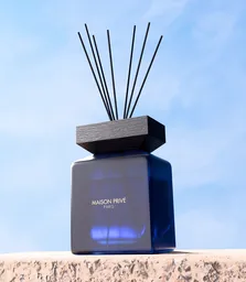 Fragrance Bottle on Stone Pedestal