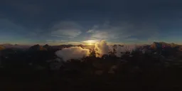 Aerial Cloudy Sunset over Mountains