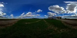 Dynamic German countryside HDRI with vivid blue skies and lush greenery for realistic lighting in 3D scenes.
