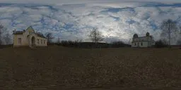 360-degree HDR panorama of a desolate field with church ruins under a dynamic cloud-filled sky for realistic lighting.