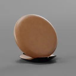 Realistic digital render of a round, tan wireless charger for smartphones, compatible with Blender 3D.