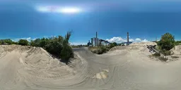 Abandoned factory on sandy land