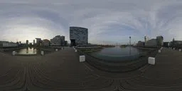 360-degree HDR panorama of Dusseldorf Bridge with modern architecture and reflective water for realistic scene lighting.