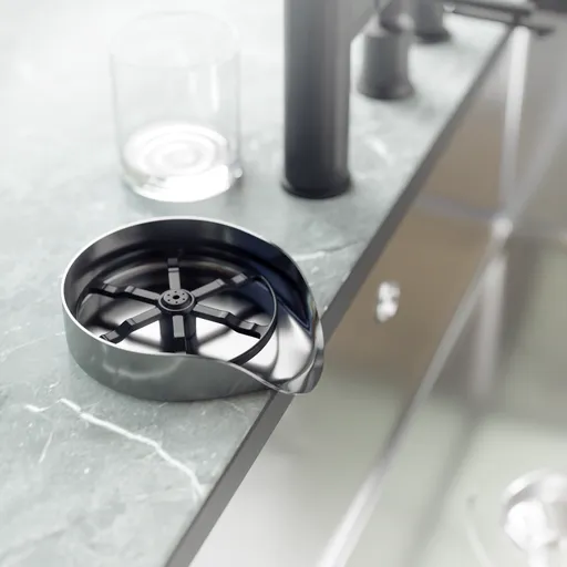 Realistic 3D rendered stainless steel glass rinser on marble countertop for Blender modeling projects.