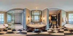 Luxurious residential bathroom HDR lighting image with marble detailing and elegant fixtures.