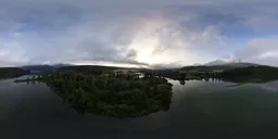 Sunrise over lake and mountains