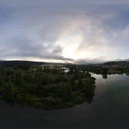 Sunrise over lake and mountains