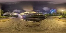 360-degree HDR panorama featuring nocturnal urban landscape with waterways, illuminated flora, and architectural elements.