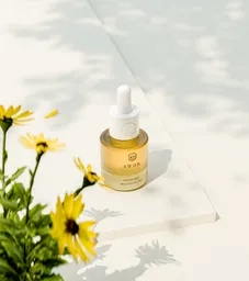 3D rendered skincare serum bottle with realistic lighting, shadows and flowers, ideal for Blender visuals.