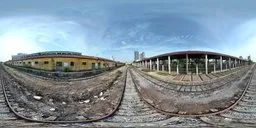 360-degree HDR panorama of derelict train tracks with clear skies for realistic lighting in 3D scenes.