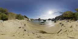 360-degree HDR panorama of a sunny beach with rocks and clear sky for realistic lighting in 3D scenes.