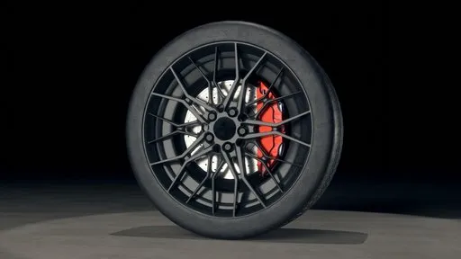 Highly detailed sports car wheel 3D model with intricate rim design and performance tire texture suitable for Blender rendering.