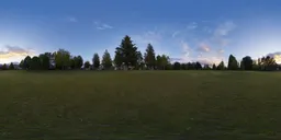 360-degree HDR panorama of a scenic sunset with vibrant clouds over a serene urban park, perfect for lighting 3D scenes.