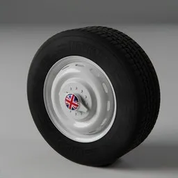 Detailed vintage car wheel 3D model with tread texture and UK flag emblem for Blender rendering.