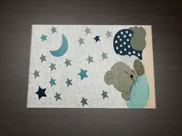 Detailed 3D model of a textured fantasy carpet with an elephant, moon and stars design, optimized for Blender.