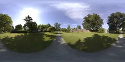 360-degree panoramic HDR image showing a sunlit pathway and trees in a vibrant city park for environmental lighting.