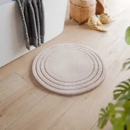 Beige bath mat