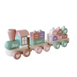 "Colorful and delicate wooden toy train modeled in Blender 3D, perfect for decorating children's environments and coffee tables. Inspiring Margo Hoff's design, the train features a pink and green engine, golden hearts, and evenly spaced vinyl designer toys. By Maruyama Ōkyo, captured in a rendered image."