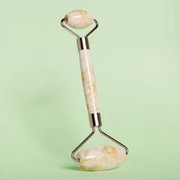 "Skincare Roller: A close-up of a marble roller with a handle on a green background. This 3D model in Blender 3D is perfect for skincare enthusiasts, featuring changable colors and a pure PBR design. Enhance your search engine optimization for Google image search with this high-resolution product photo."