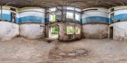 Daylight HDR image displaying a dilapidated interior with overgrown windows and peeling walls.