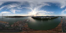 River, City and Bridge at Sunset